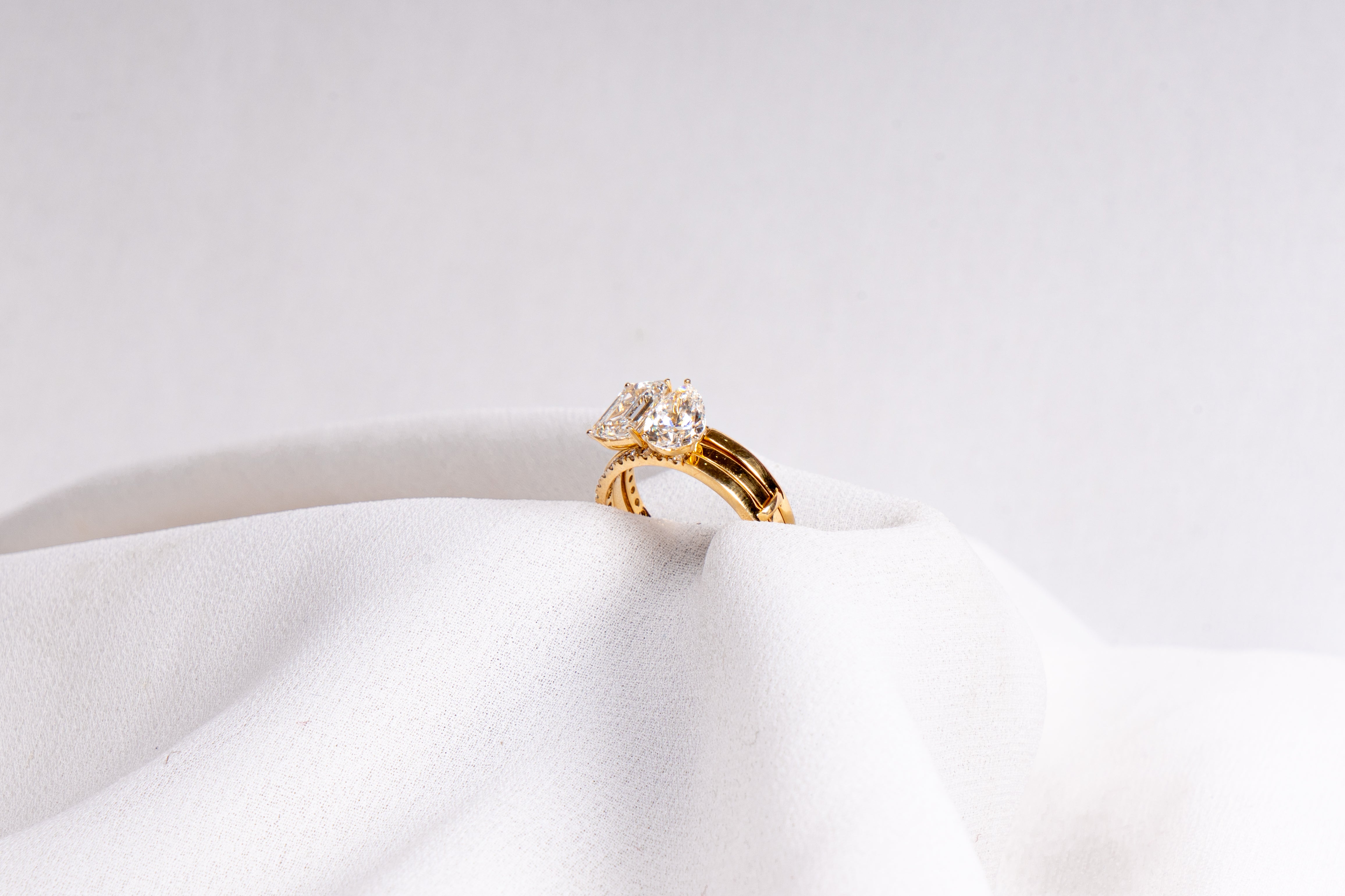 Pear and Emerald Cut Engagement Ring Set