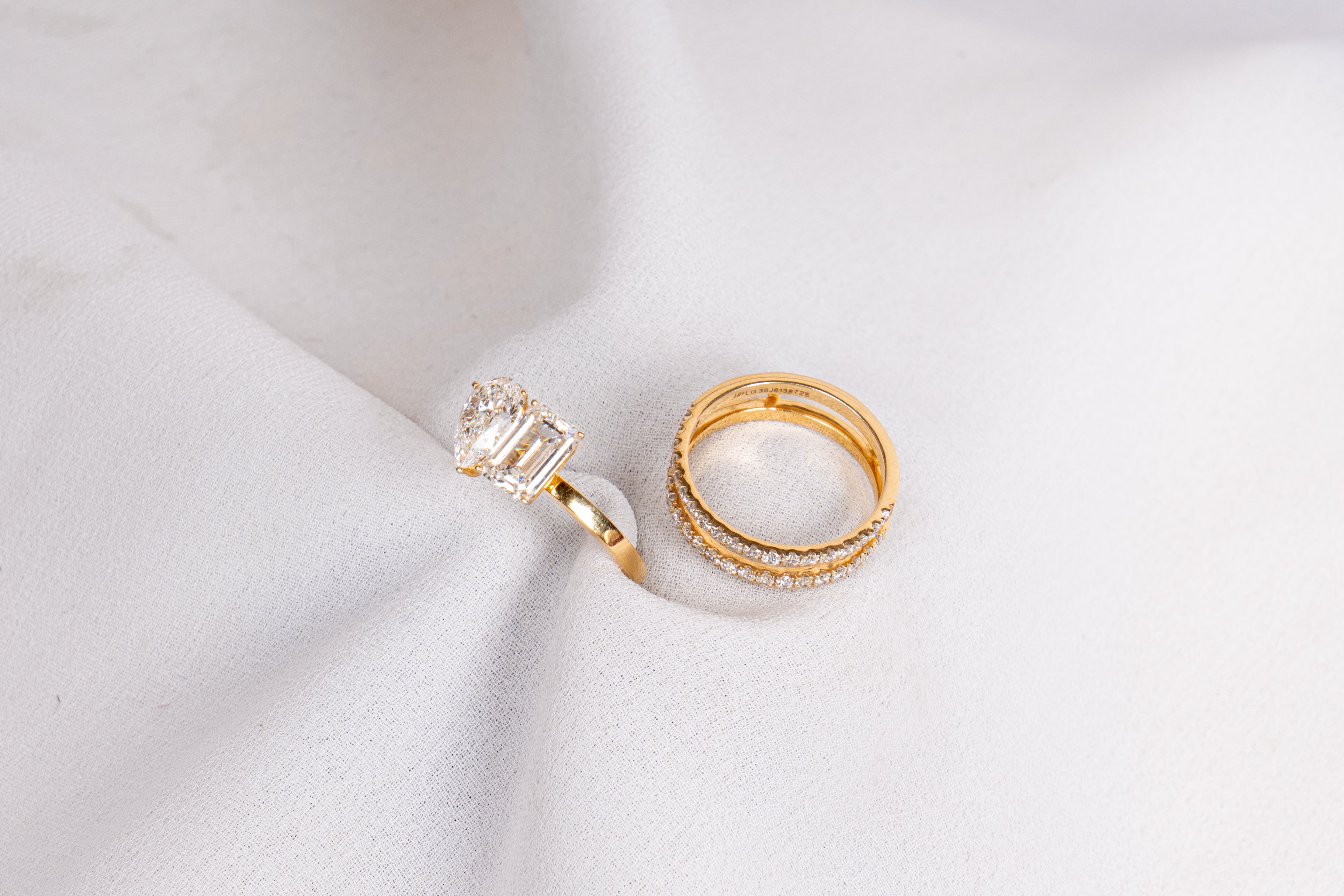 Pear and Emerald Cut Engagement Ring Set