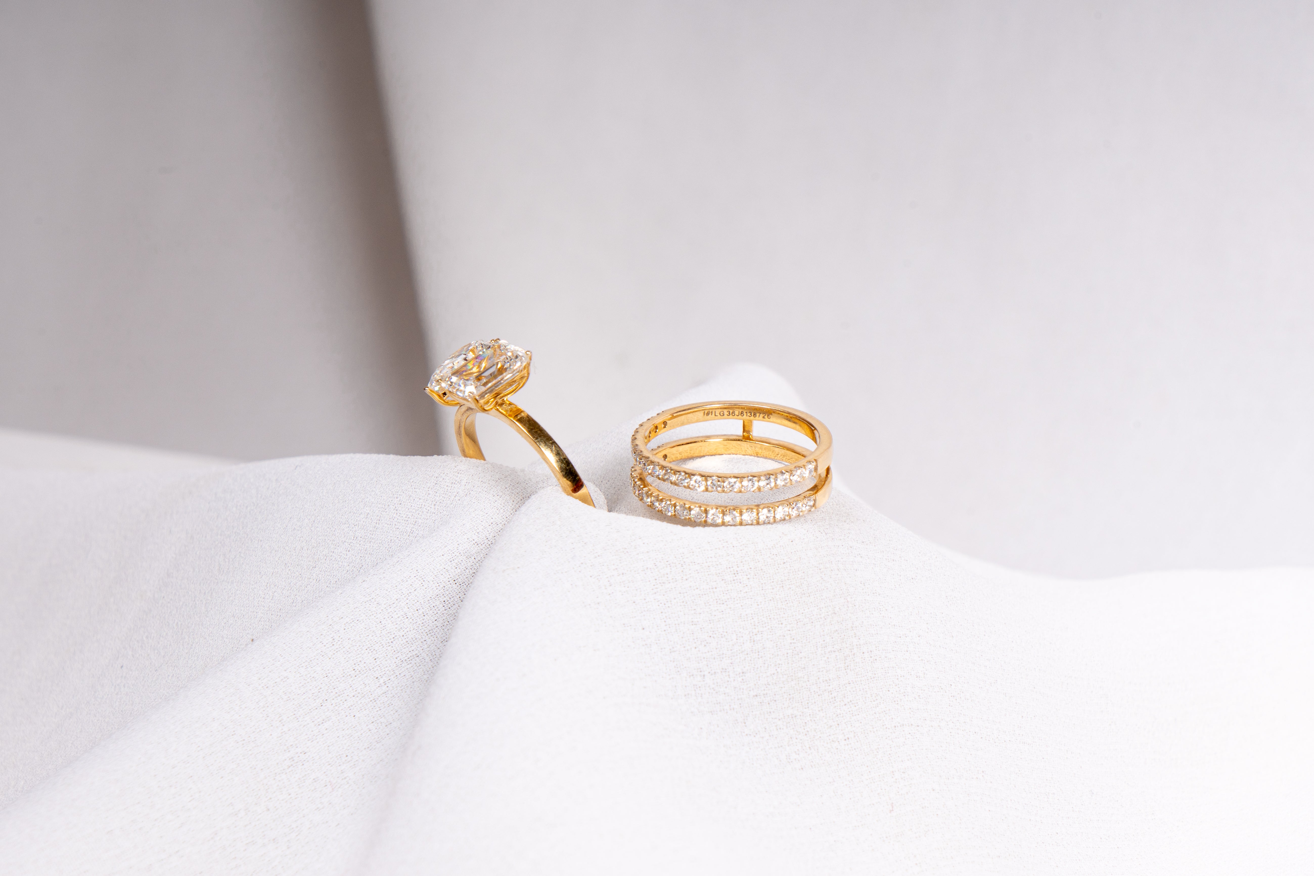 Pear and Emerald Cut Engagement Ring Set