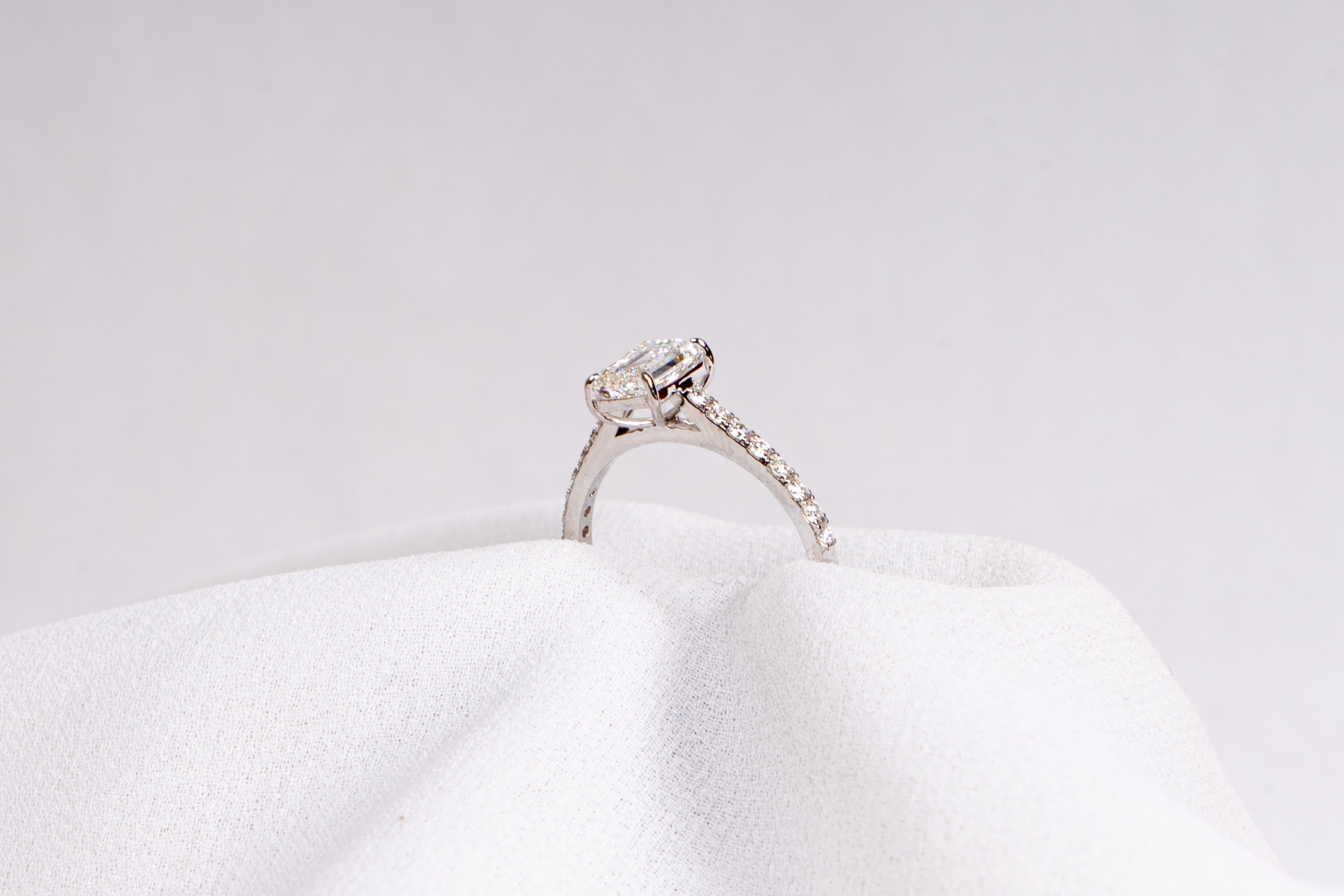 Emerald Cut Solitaire Pavé Engagement