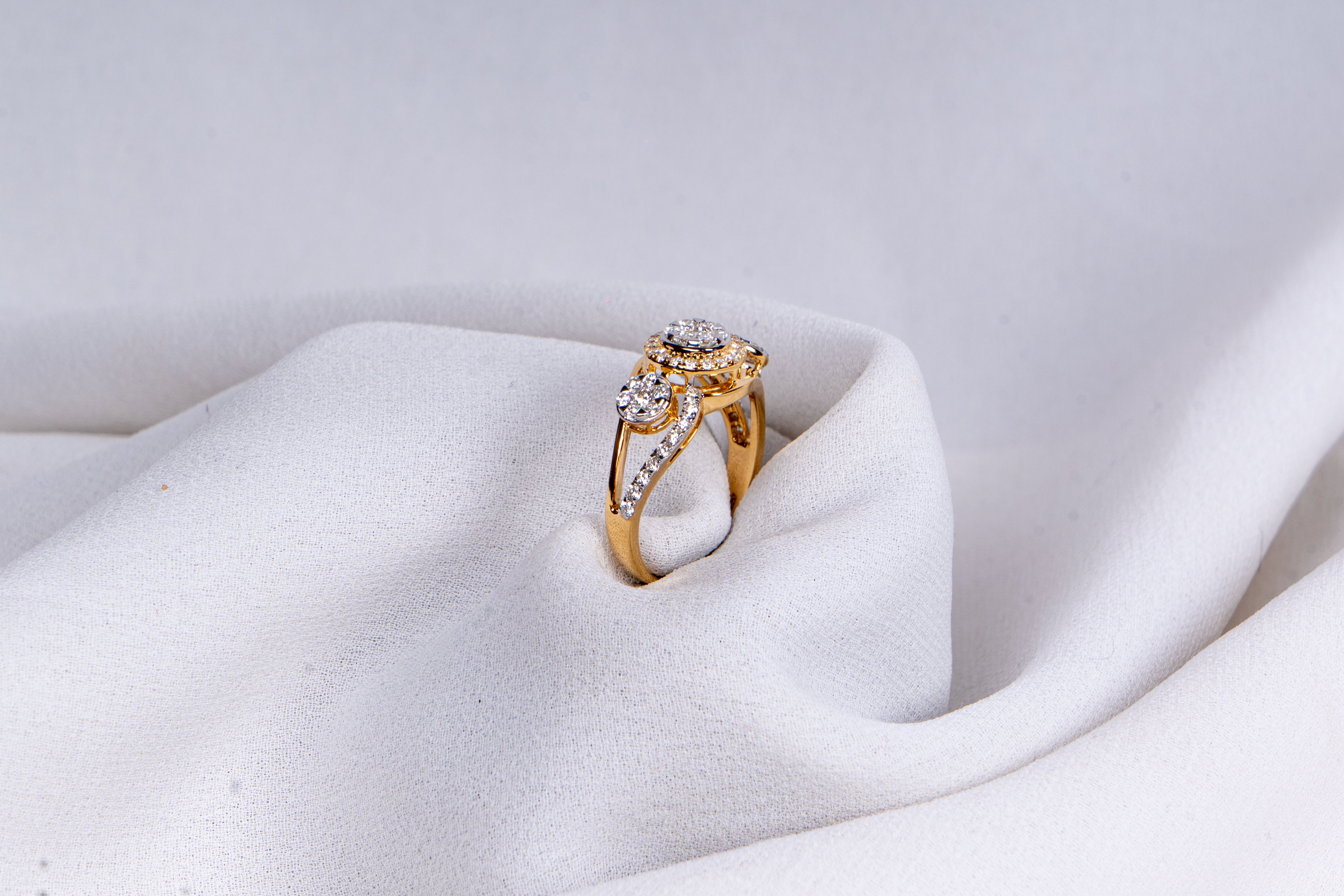 Celestia Three-Stone Halo Ring