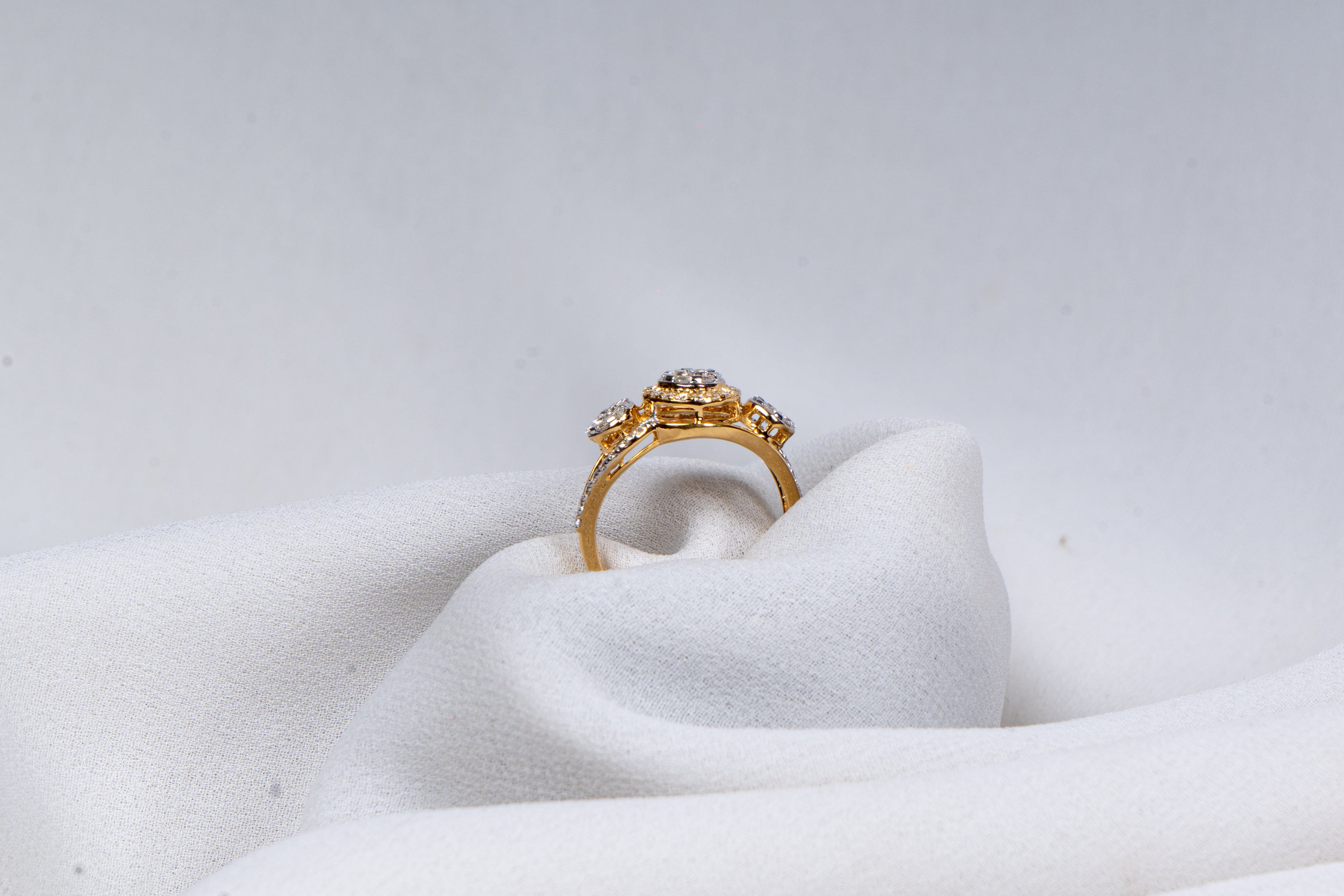 Celestia Three-Stone Halo Ring