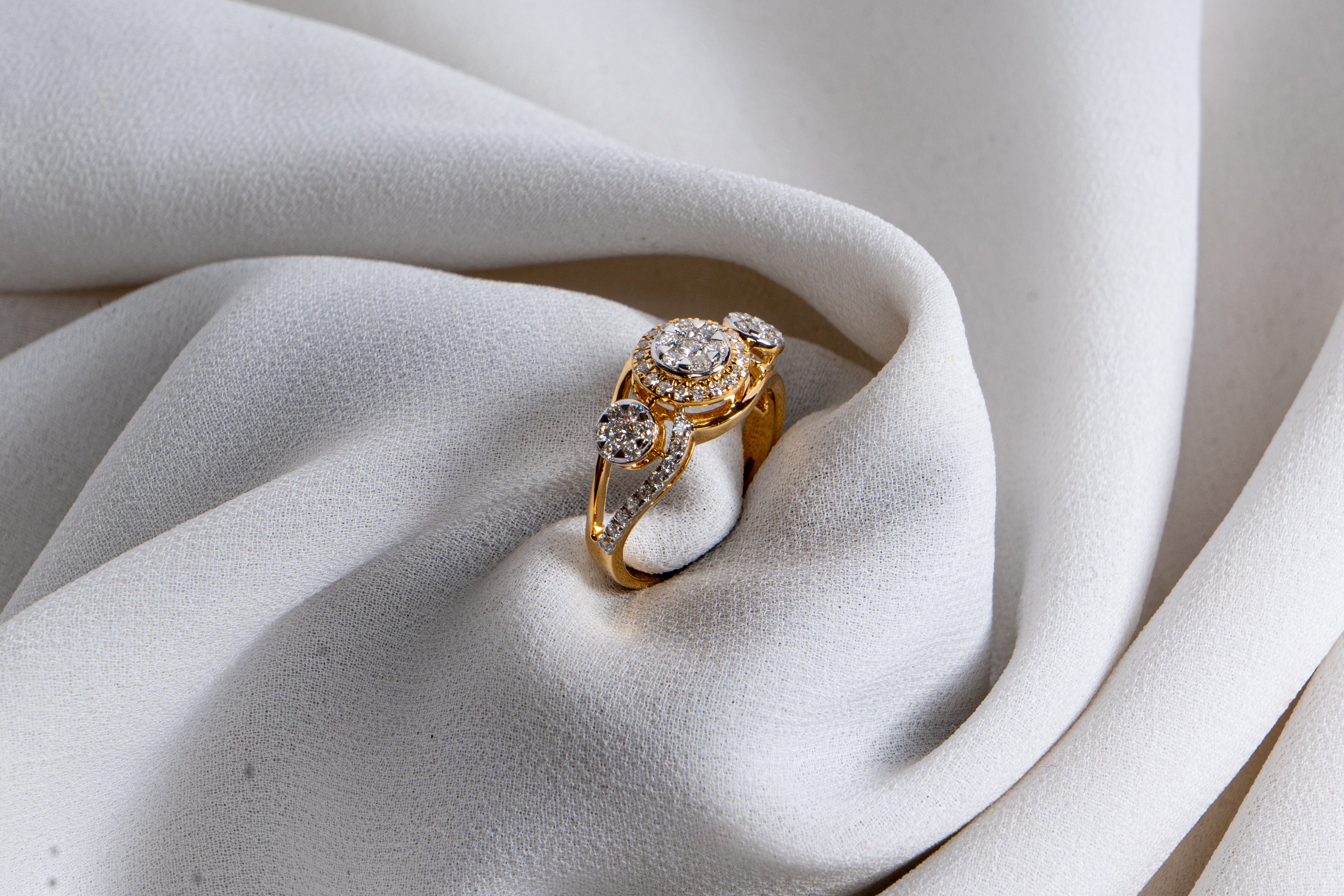 Celestia Three-Stone Halo Ring