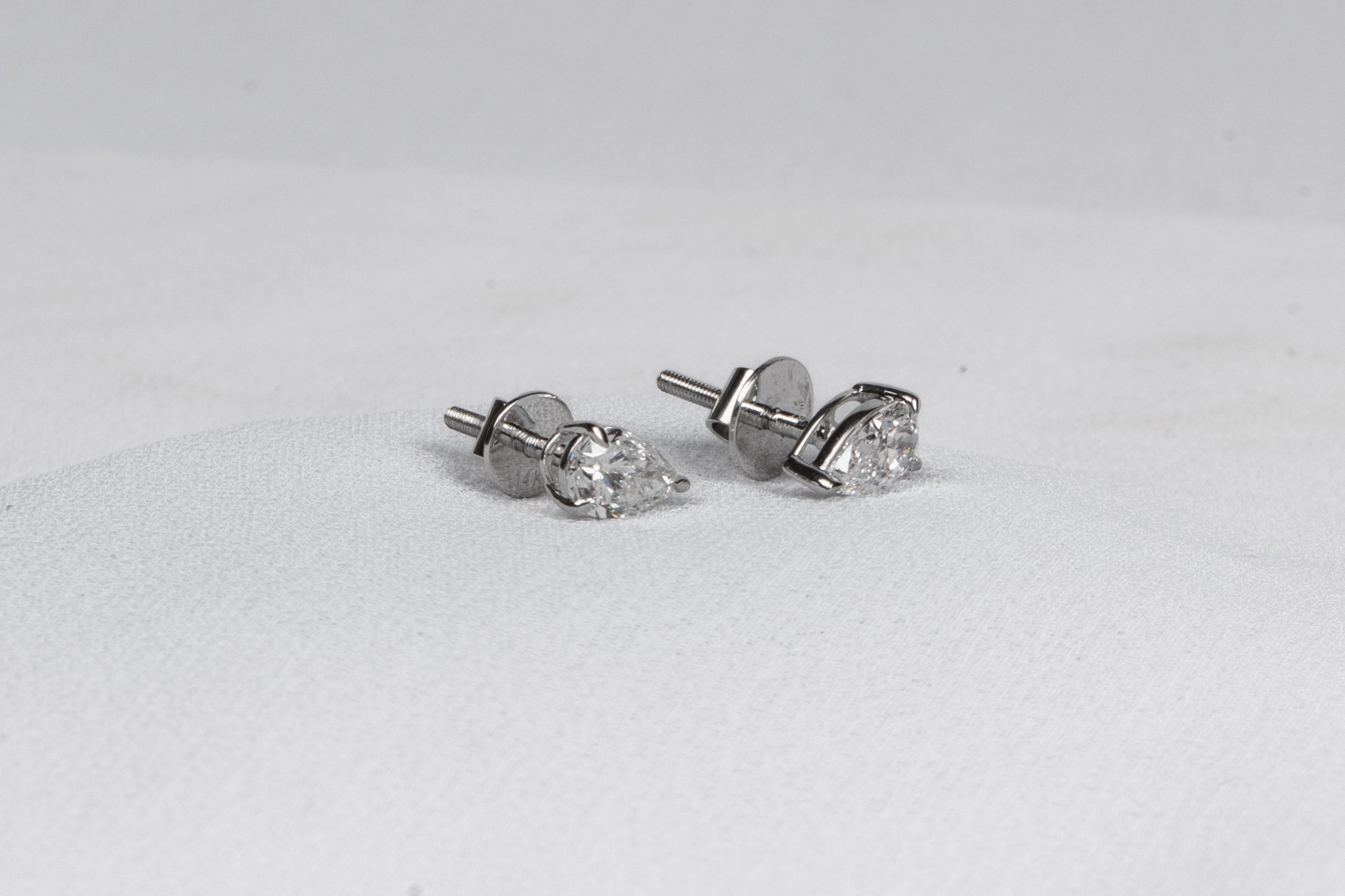Celestia Pear Solitaire Stud Earrings