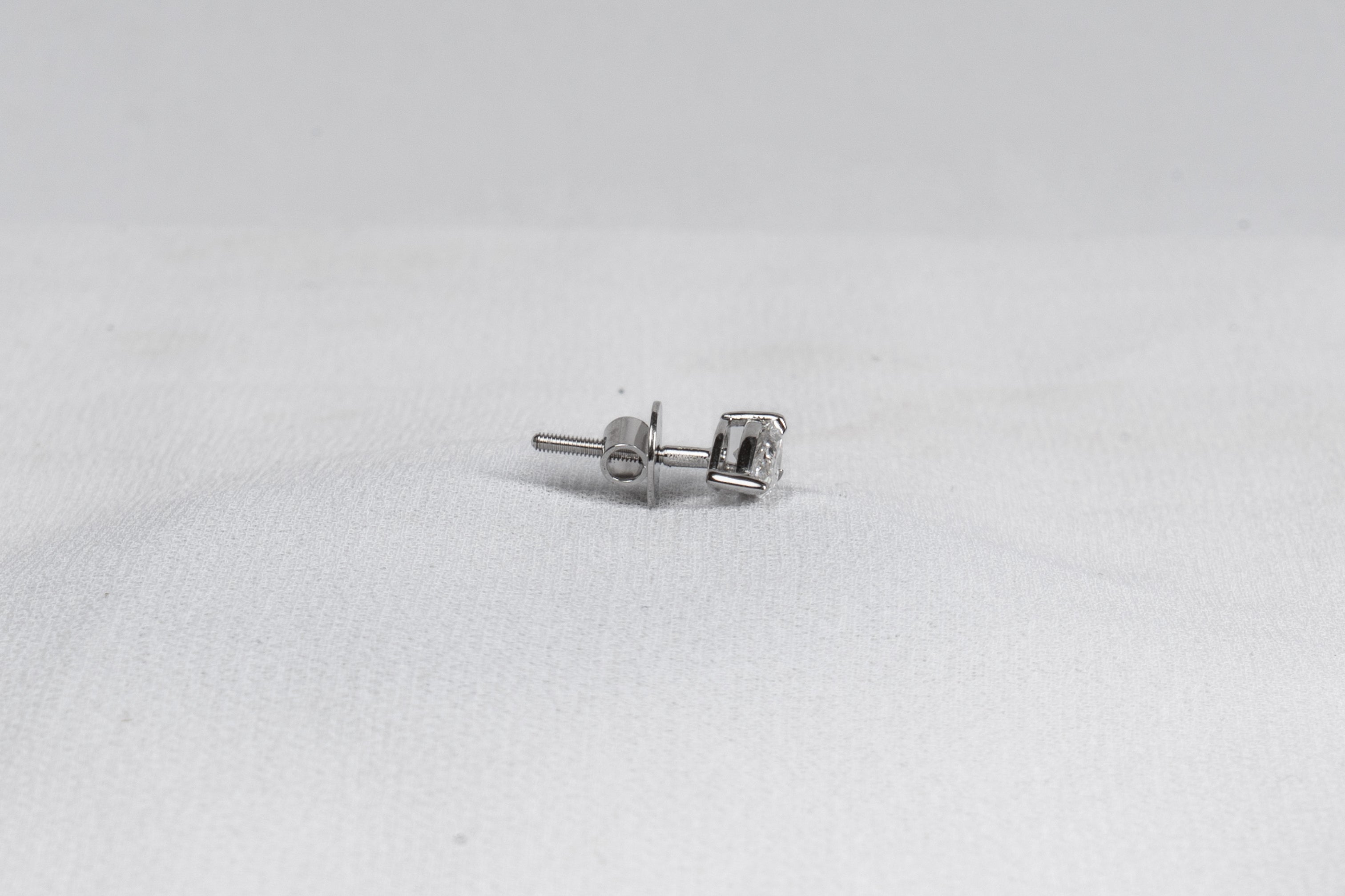 Celestia Pear Solitaire Stud Earrings