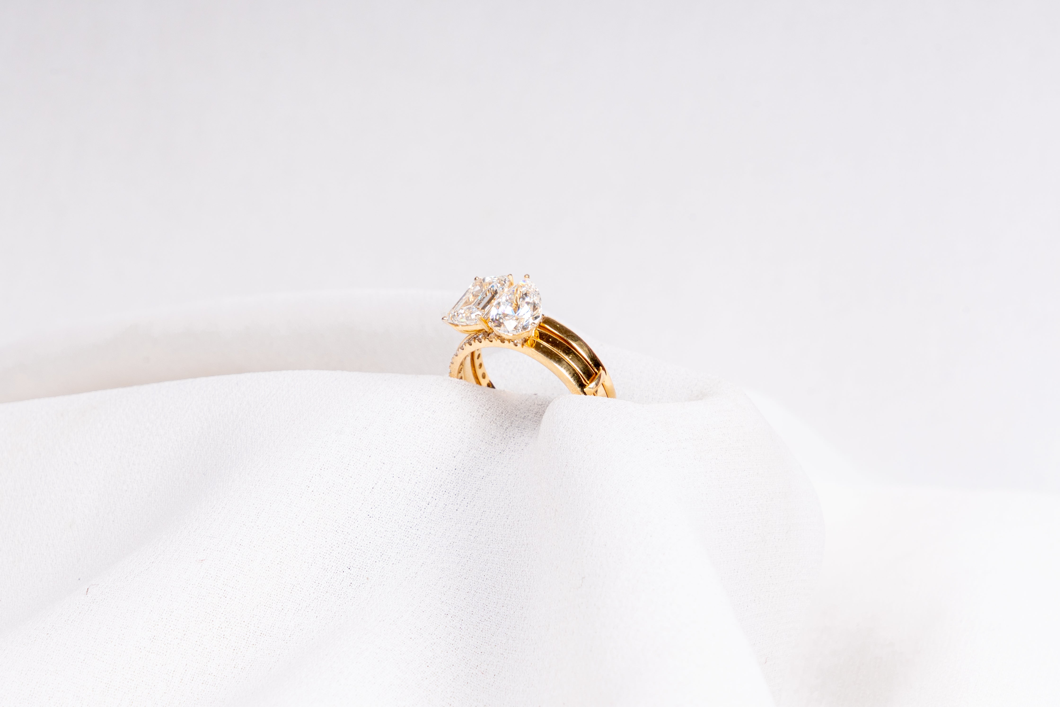Pear and Emerald Cut Engagement Ring Set