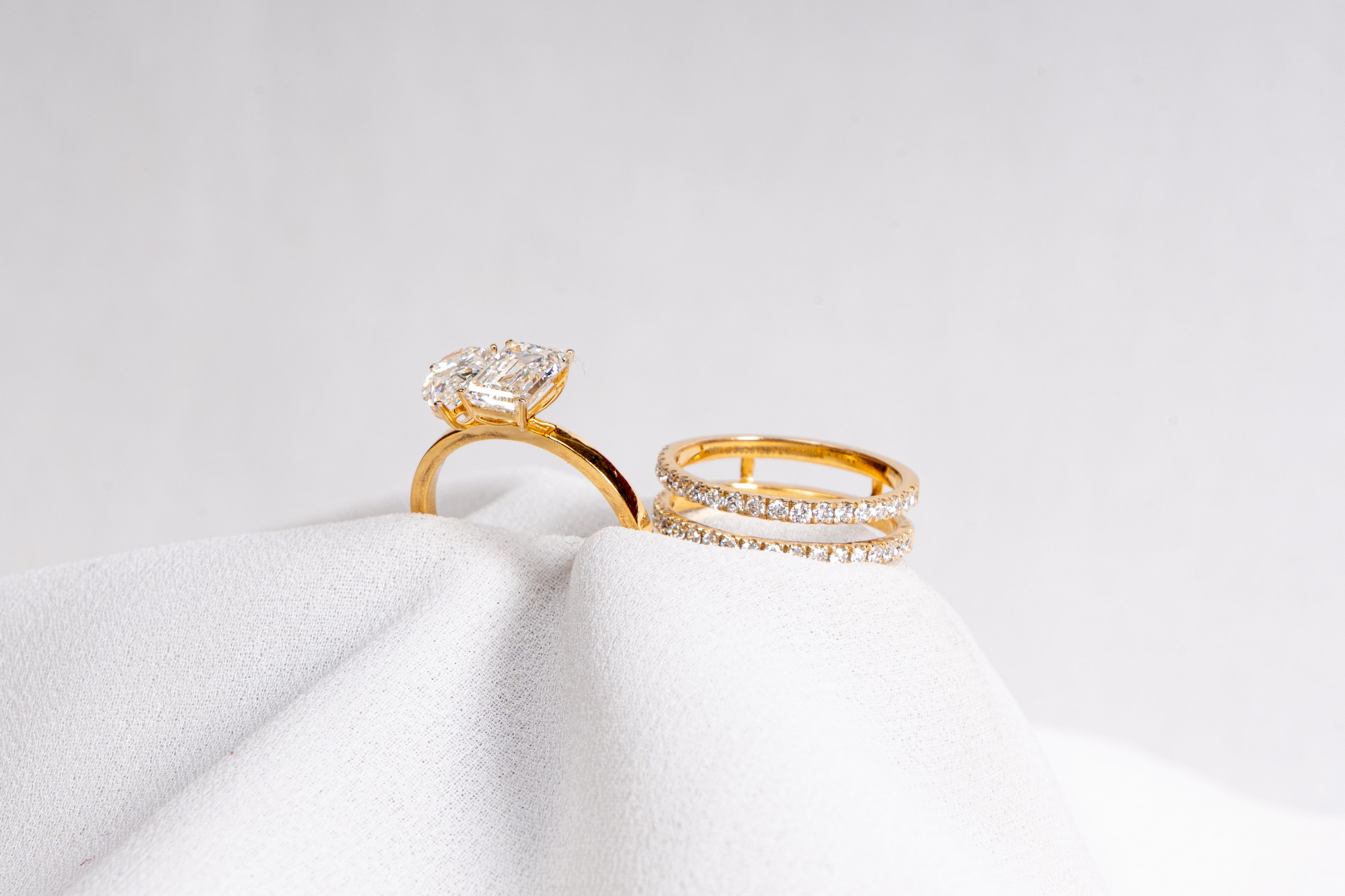 Pear and Emerald Cut Engagement Ring Set