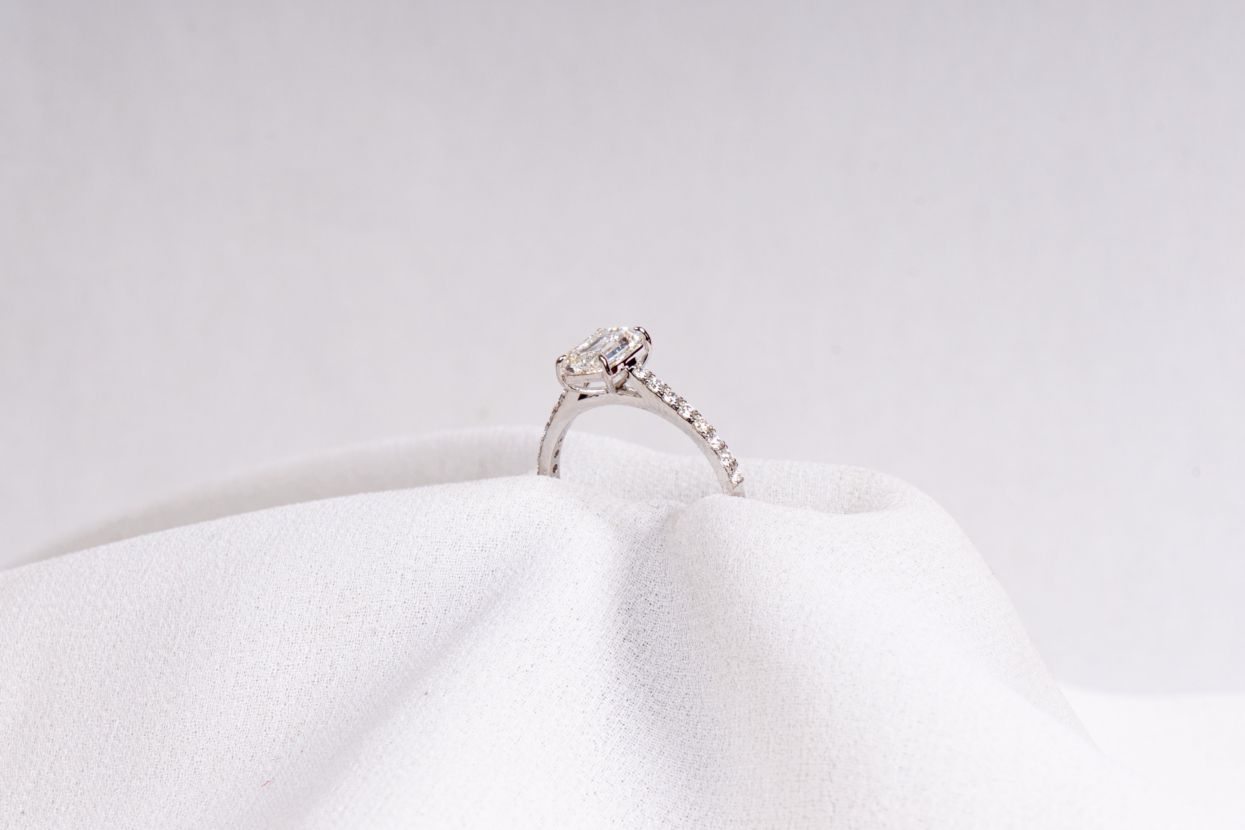 Emerald Cut Solitaire Pavé Engagement