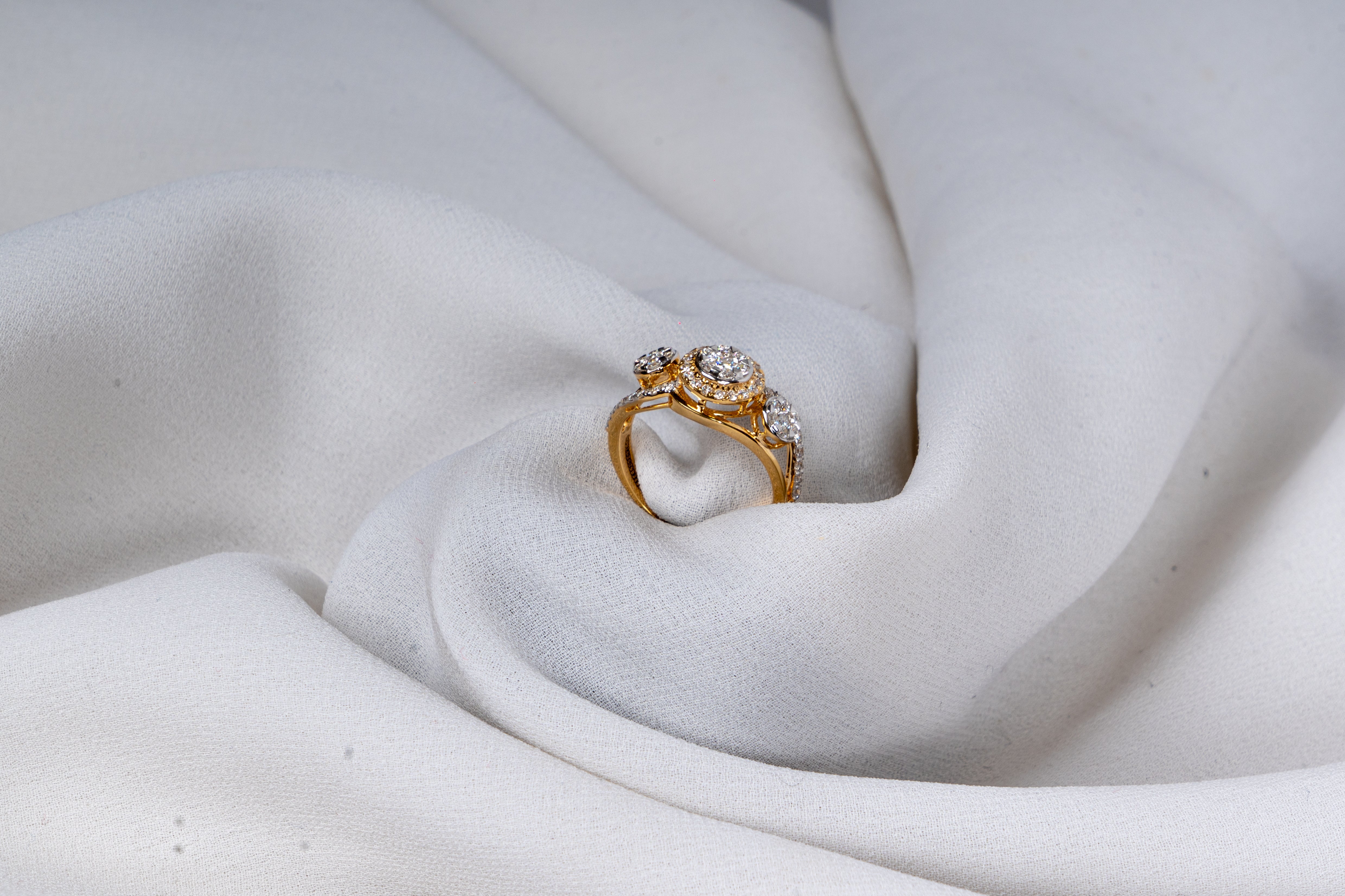 Celestia Three-Stone Halo Ring