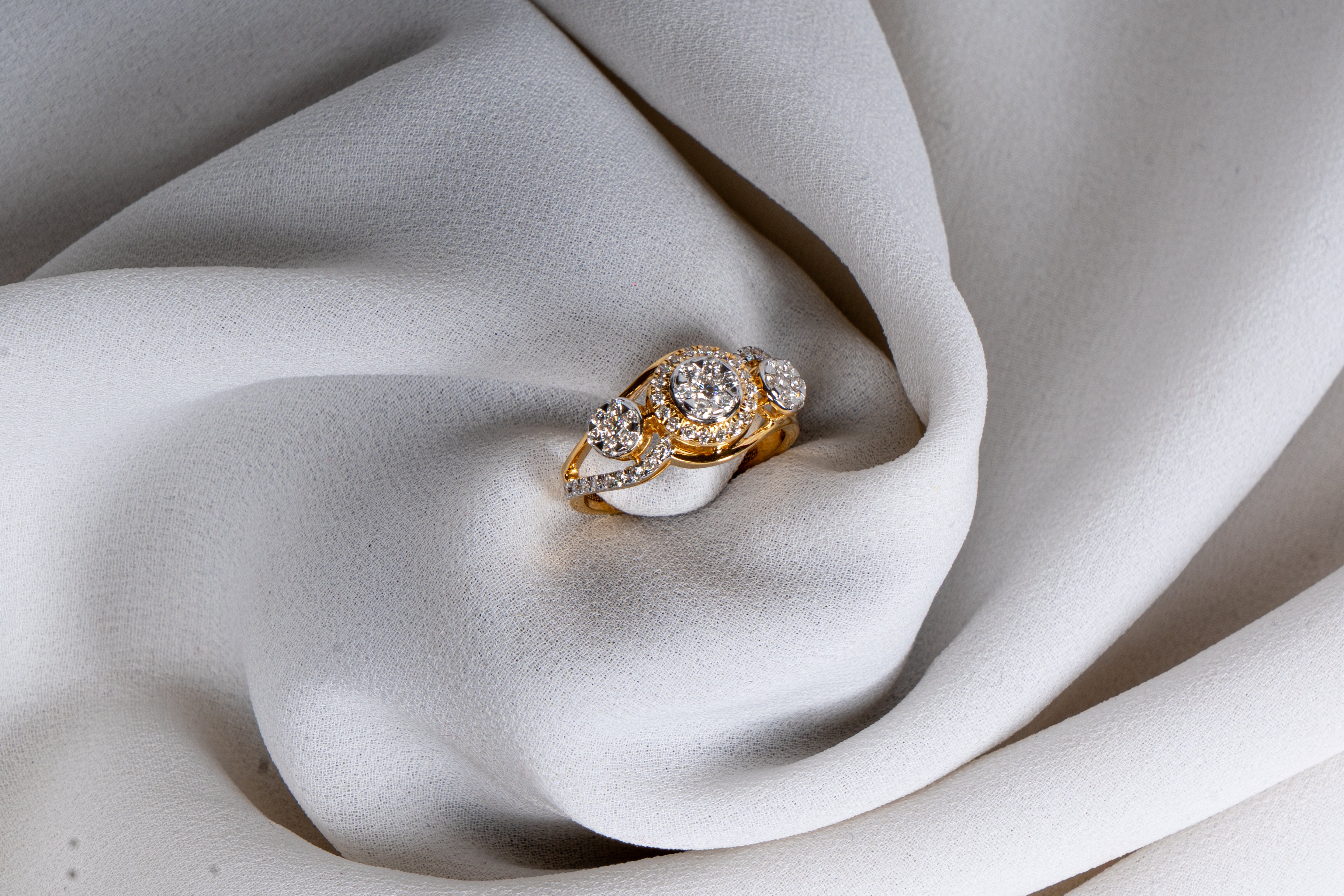 Celestia Three-Stone Halo Ring